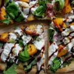 Grilled peach flatbread topped with prosciutto and fresh herbs