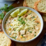 Crockpot Cream Cheese Chicken Chili in a bowl with toppings
