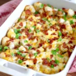 Bacon Ranch Potato Bake topped with crispy bacon and ranch seasoning