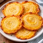 Delicious cheesy onion crisps served in a bowl