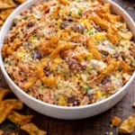 Delicious Frito Cowboy Cabbage served in a bowl with toppings.