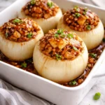 Sweet and Sour Teriyaki Chicken Stuffed Onions served on a plate