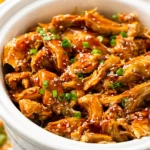 Delicious Dump and Go Crockpot Teriyaki Chicken served over rice.