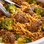 Bowl of Slow Cooker Beef Ramen Noodles with beef, vegetables, and savory broth