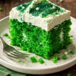 Delicious Shamrock Poke Cake with green layers for St. Patrick's Day celebration