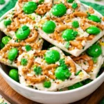 Delicious St. Patrick's Day Bark decorated with green and gold sprinkles