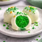 Festive St. Patrick’s Day cake balls decorated with green accents.