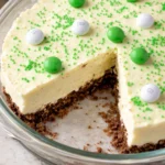 St. Patrick's Day themed ice cream cake with green and gold decorations