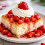 Delicious Strawberry White Chocolate Cake with fresh strawberries on top