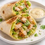 Delicious Chicken Caesar wraps filled with lettuce, chicken, and Caesar dressing