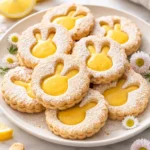 Easter Lemon Linzer cookies decorated with pastel colors and bunny shapes