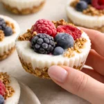 Frozen yogurt granola power cups topped with fresh fruits and granola