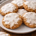 Batch of iced oatmeal cookies with a sweet glaze on top
