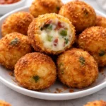 Delicious jalapeño poppers stuffed with cheese and herbs on a platter