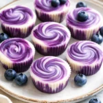Blueberry swirl yogurt bites in a bowl, showcasing a healthy snack option.
