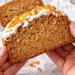 Delicious gluten-free carrot cake topped with cream cheese frosting