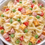 Delicious Bowtie Pasta Salad with colorful vegetables and dressing