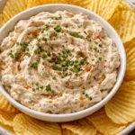 Bowl of easy French onion dip served with potato chips