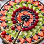 Delicious easy fruit pizza topped with fresh fruits on a sweet crust