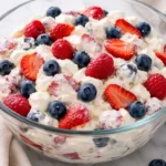 Red White and Blue Cheesecake Salad with berries and cream cheese