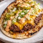 Delicious Smash Burger Tacos with crispy tortillas and juicy burgers.