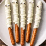 Mummy Chocolate Covered Pretzels decorated for Halloween